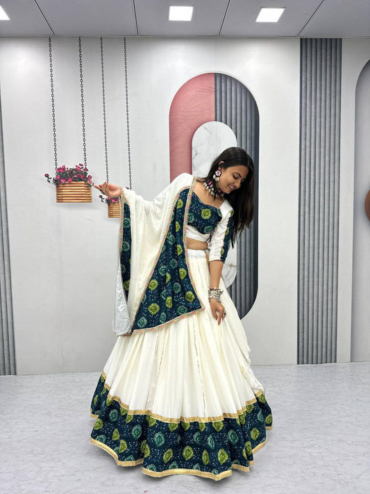 Riyon Cotton With Ajarakh Print And Ribbon Lace Work Canvas Patta Lehenga Choli