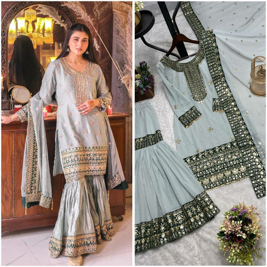 HEAVY FAUX GEORGETTE AND BANGLORI SATIN WITH ATTRACTIVE EMBROIDERY SEQUENCE AND RIVETED MOTI WORK SHARARA DRESS