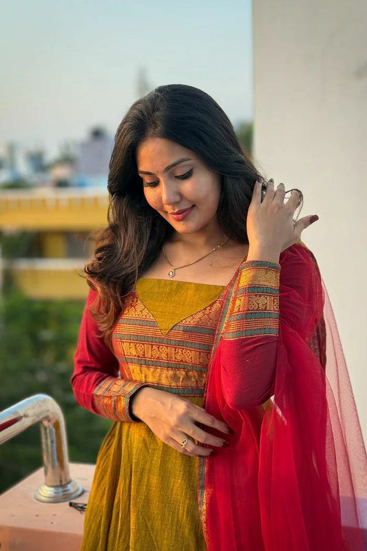 This top made from vichitra silk fabric with Jacquard weaving zari border And soft net Duppatta with lace border