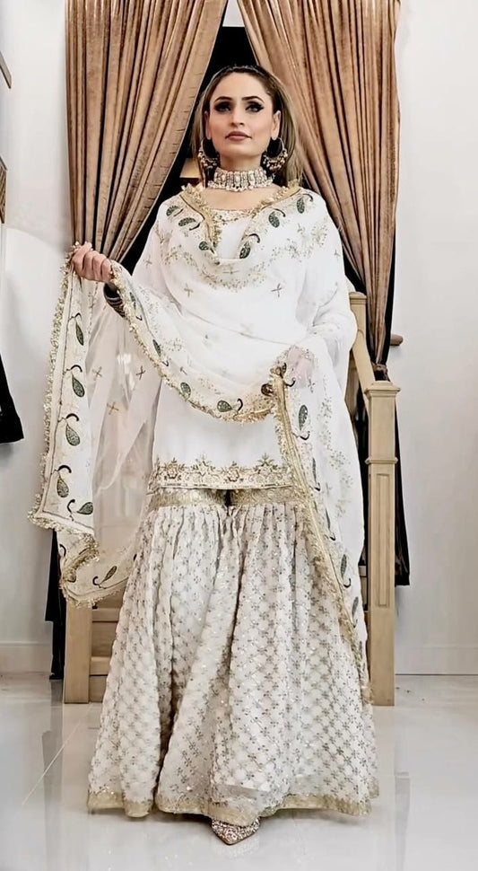 Heavy Faux Georgette And Heavy Micro Cotton With Embroidery Sequence Work And Lace Border Sharara Palazzo Dress
