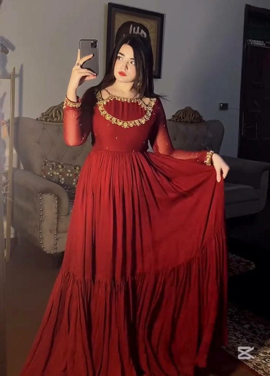 Heavy Faux Georgette With Tow Lyre’s Ruffles & Embroidery Sequence Work With Rivet Moti Work With Elastic Bottom Gown