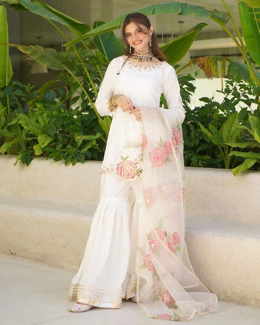 Pure Natural Crepe And Embroidery Sequence Work With Fancy Tassels And Chiroski Diamond Work Dupatta Type Palazzo Dress