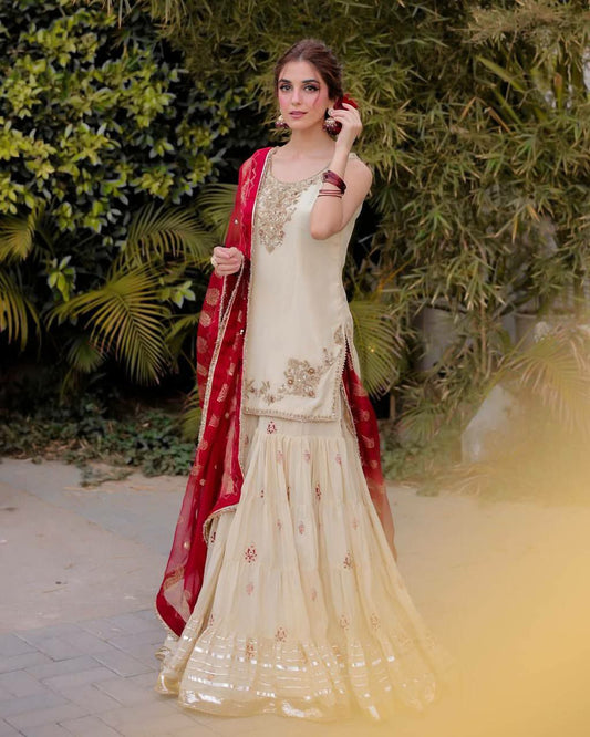 CHINON AND SEQUENCE EMBROIDERY WITH LACE WORK AND LATKAN ON BACK SIDE DORI WITH GOTAPATTI LACE WORK SHARARA DRESS