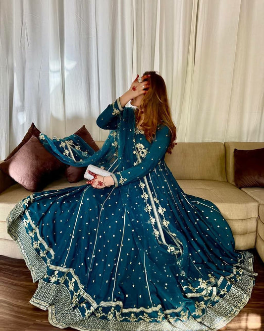 HAVY STAR GOARGATE WITH EMBRODARY WORK WITH FULL SLEEVES AND FOUR SIDE LACE WORK GOWN