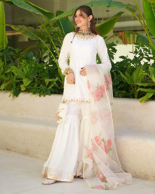 Pure Natural Crepe And Embroidery Sequence Work With Fancy Tassels And Chiroski Diamond Work Dupatta Type Palazzo Dress