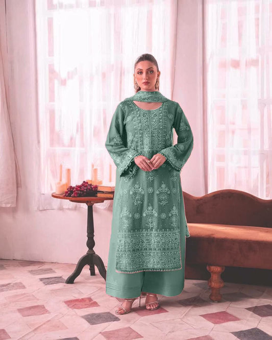 HEAVY FAUX GEORGETTE AND BEAUTIFUL EMBROIDERY SEQUENCE WORK WITH RIVETED MOTI WORK PALAZZO KURTI