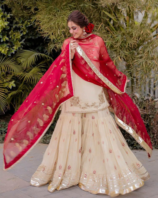CHINON AND SEQUENCE EMBROIDERY WITH LACE WORK AND LATKAN ON BACK SIDE DORI WITH GOTAPATTI LACE WORK SHARARA DRESS