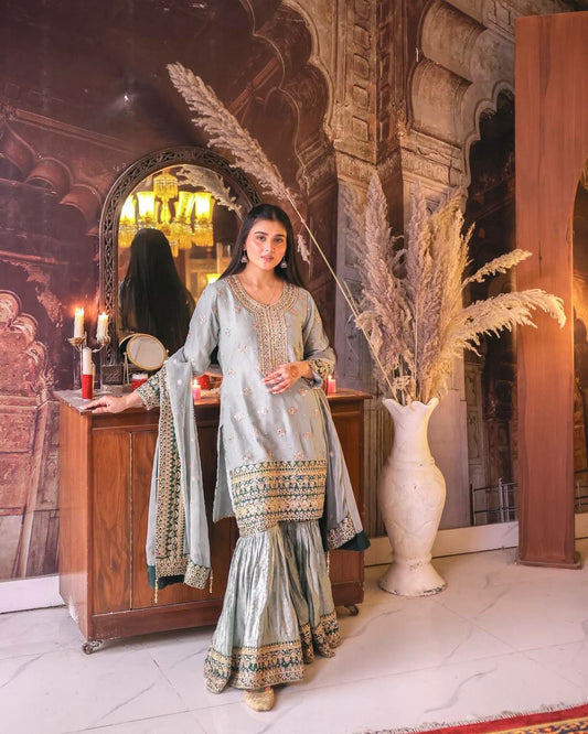 HEAVY FAUX GEORGETTE AND BANGLORI SATIN WITH ATTRACTIVE EMBROIDERY SEQUENCE AND RIVETED MOTI WORK SHARARA DRESS