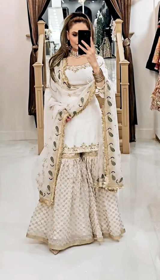 Heavy Faux Georgette And Heavy Micro Cotton With Embroidery Sequence Work And Lace Border Sharara Palazzo Dress