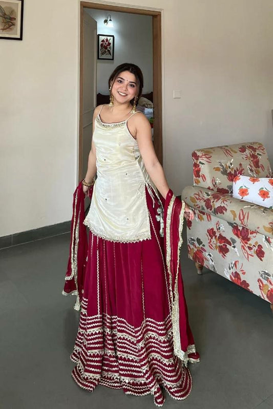Classic Ethnic Contrast: Ivory Strappy Kurti with Deep Maroon Festive Skirt